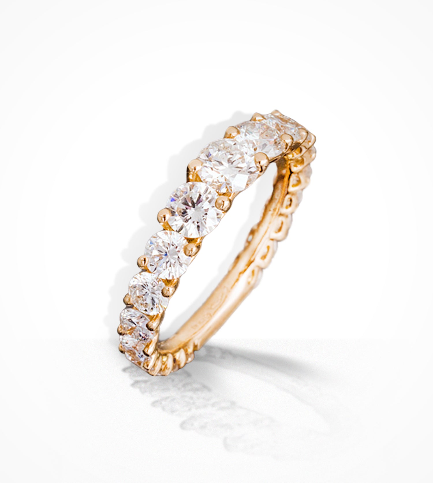 RG00036 18K rose gold tapered eternity band 19-Diamonds in two claw settings
