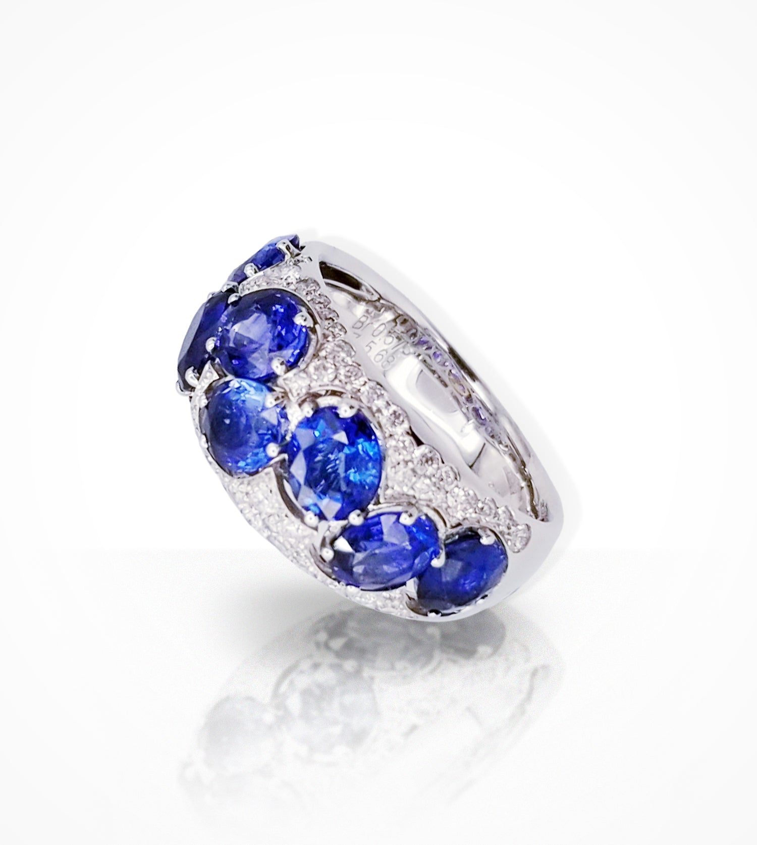 RG00170 18KW ring set with 7-oval sapphires=5.68cts and diamonds=0.57cts